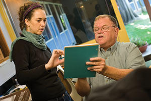 A student consults a member of the financial aid staff